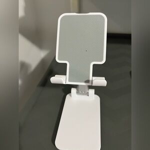 Cell phone stand for use at home
